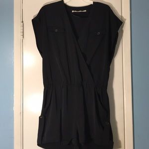 Black romper with button accents